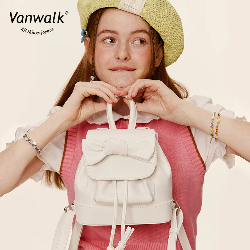 Genuine backpack, shoulder bag with bow