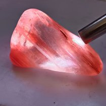 Actual shot of a piece of translucent red cotton crystal the Ayu Gobi Stone in Daltan Alxa Inner Mongolia.