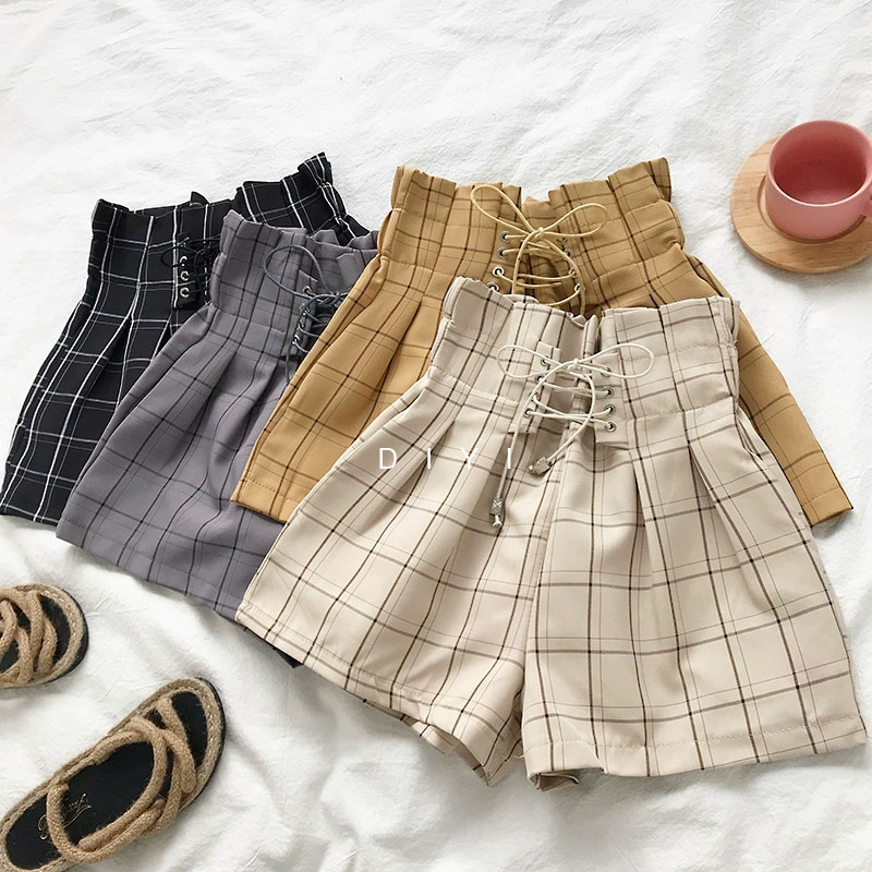 Mùa hè 2018 phiên bản Hàn Quốc mới của hoa eo cao hoang dã 苞 dây đeo kẻ sọc quần short nữ rộng ống rộng thoải mái sinh viên nóng bỏng