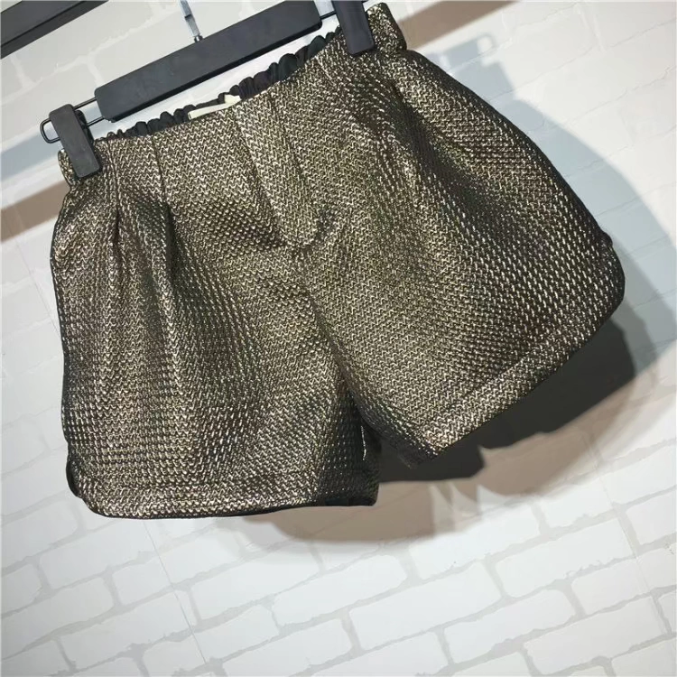 Mát mẻ mùa thu mới vàng co giãn eo quần short nữ sinh lỏng lẻo quần rộng chân rộng quần hoang dã