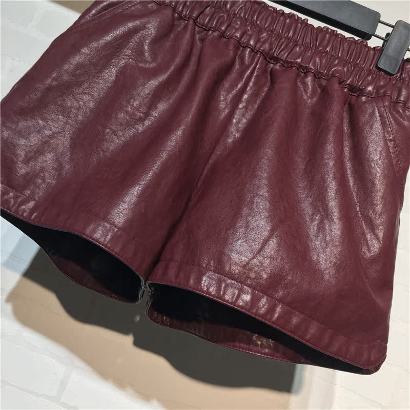 Quần da mùa thu đông mát mẻ Phiên bản Hàn Quốc mới của quần thun lưng cao một từ quần short da nữ hoang dã rộng chân rộng quần quần shop quần áo nữ