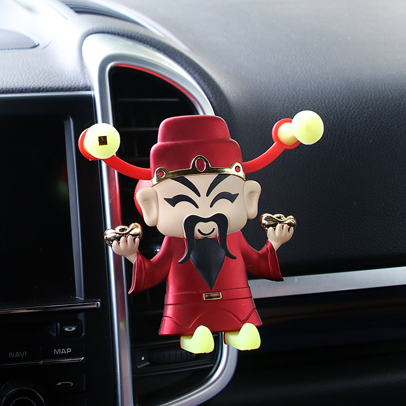 Car mobile phone bracket creative cash with night light general car air conditioning air outlet gravity navigation support frame