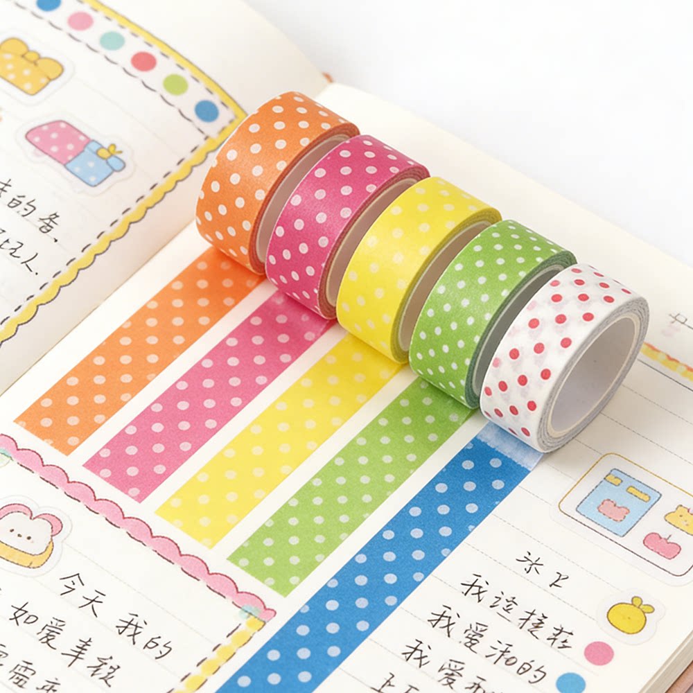 Colorful polka dot journal stickers, floral patterns, white dots, and washi tape