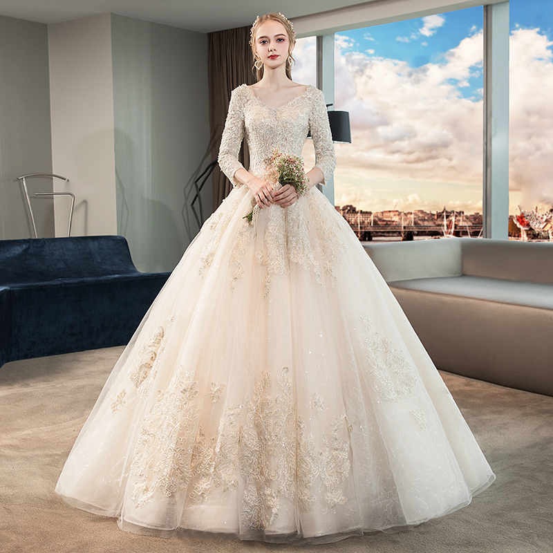 The main wedding dress 2021 new bridal temperament Forest department one-word shoulder champagne color dream tail small man spring and autumn