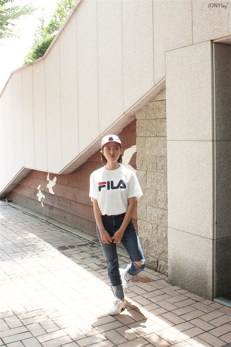 [Korea Fila] 18 năm chữ lớn LOGO Những người yêu thích áo phông ngắn tay bình thường FS2RSA2001X - Áo phông thể thao áo tank top gym