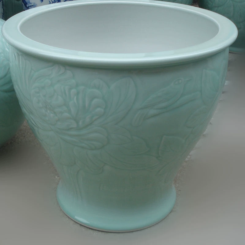 Jingdezhen anaglyph peony celadon quiver and calligraphy jingdezhen celadon porcelain quiver peony flowers cylinder