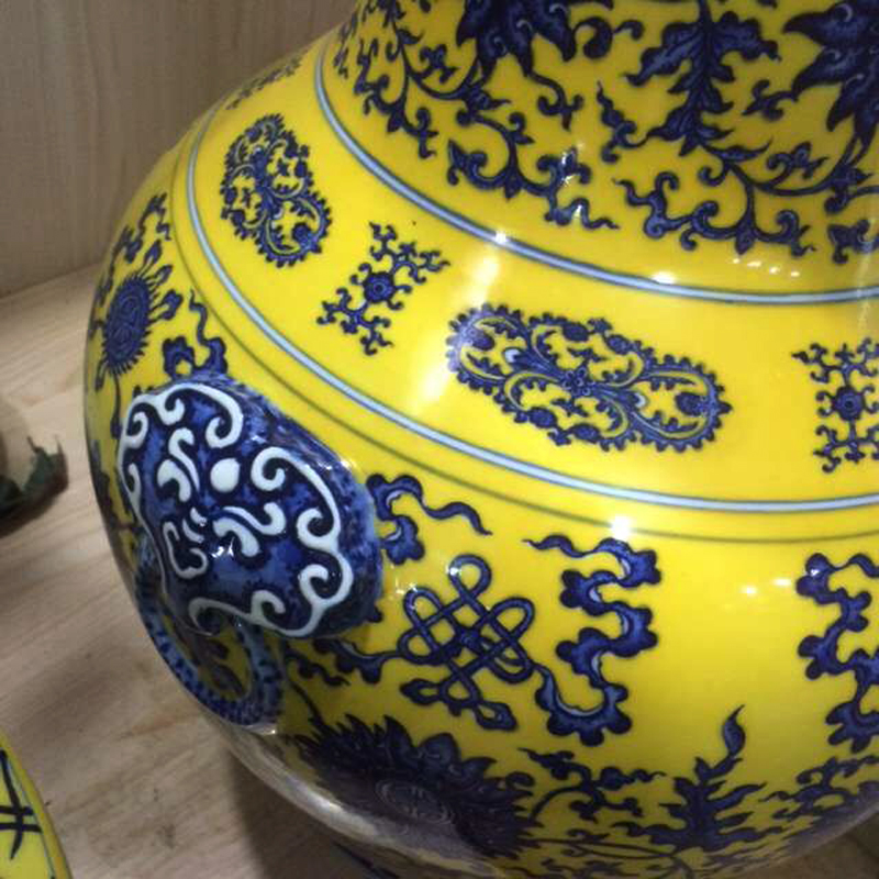 Jingdezhen porcelain vase hand - made of hand - made imitation qianlong imperial porcelain porcelain pomegranate pomegranate bottles on yellow background