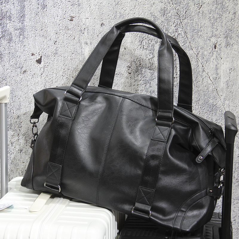 Trendy men's portable travel bag large-capacity leather diagonal travel bag short-distance business trip boarding bag trendy shoulder bag