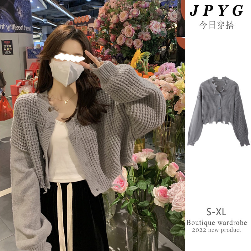 Short cardigan sweater women's 2022 autumn and winter new style thin hollow design long-sleeved knitted sweater coat tide