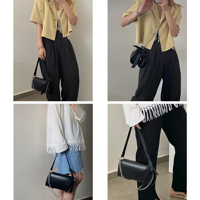 Borsa a tracolla nera con catena elegante e versatile per donna_voghion.com