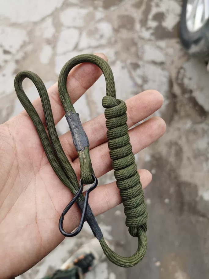 Green old-fashioned retro keychain, genuine leather