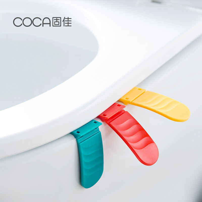 Japanese household high-grade toilet lid holder Creative snap type silicone lid holder Portable non-dirty hand toilet accessories