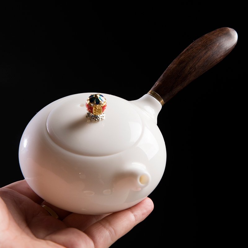 Dehua suet jade white porcelain teapot Chinese style household ceramics kung fu tea set solid wood side manual single pot teapot