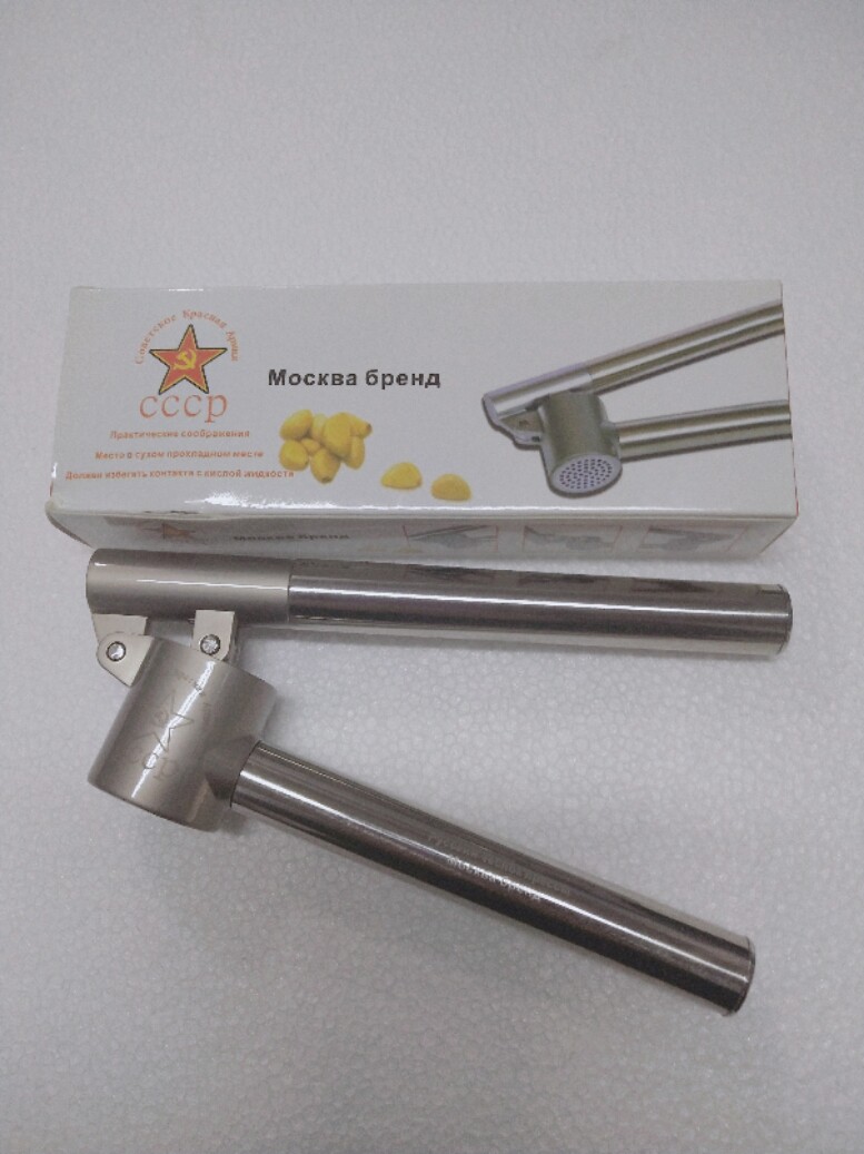 Russian characteristic all-steel easy-to-clean garlic clip garlic clip home kitchen