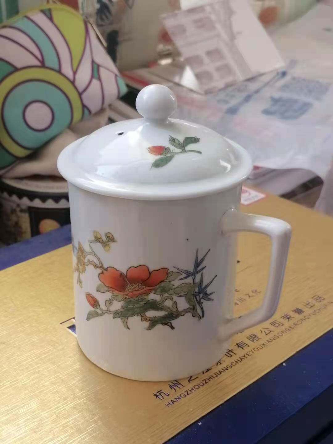 Hand-painted tea cup with plum and bamboo pictures during the Cultural Revolution - unfortunately there are two small knocks