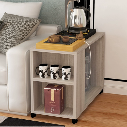 Гостиная рядом с диваном гостиной северной кофейный столик, боковой шкаф, узкий, а длинная комната Маленькая спальня Телефон