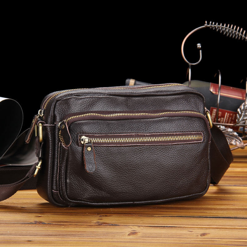 Korean version of business men's bag fashion trend new horizontal style simple shoulder Messenger bag casual sports men's small backpack