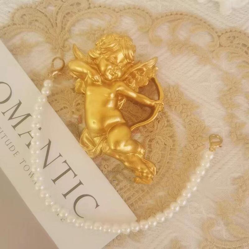 French Retro Golden Little Angel Wall Hanging Decoration Picture Frame Pearl Chain Bow Fan Photo Props French Retro Golden Little Angel Wall Hanging Decoration Picture Frame Pearl Chain Bow Fan Photo Props