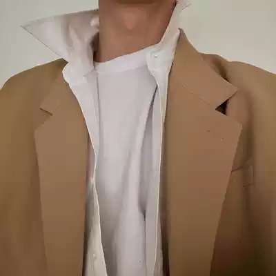 Coln homemade designer style double-breasted men's blazer that follows the classic suit elements and high-end explosive watches