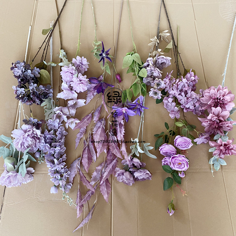 Purple wedding hall ceiling flower material soft decoration floral haze purple color leaf material purple orchid magnolia ground row flower arrangement