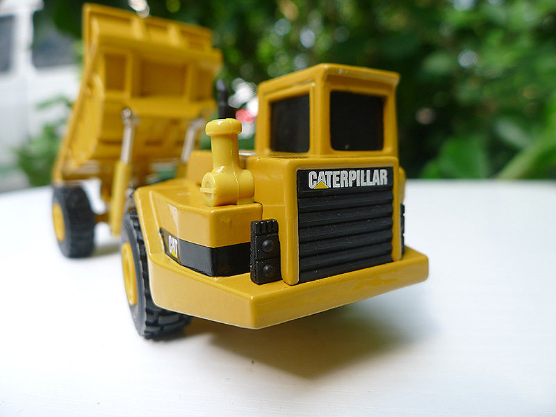 Модель машины cat d25d articulated truck卡特合金矿山车模型 norscot 1:64
