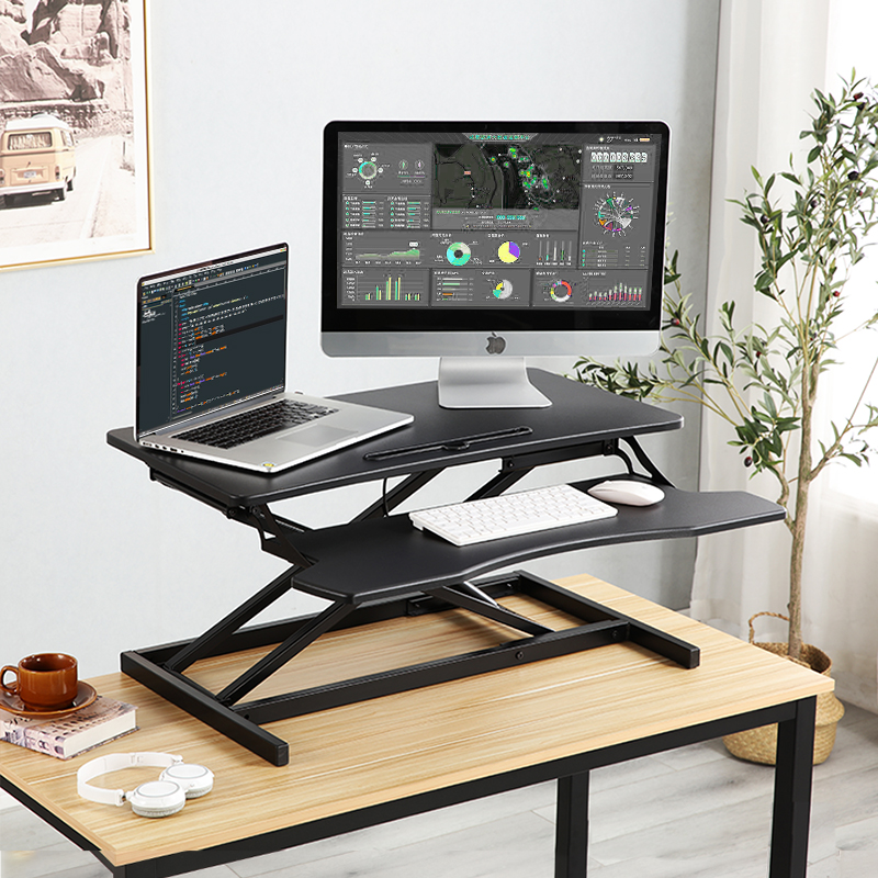 Standing upright computer desk pneumatic lifting table desk desk folding table adjustable desktop computer heightening bracket