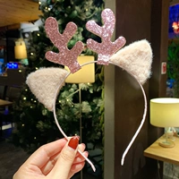 Красная плюшевая кошка