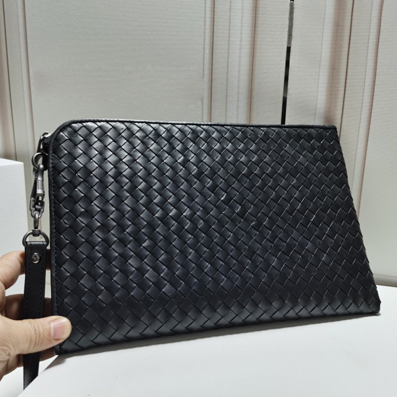 Hand carrying bag New wave male Fetal Calf Leather Woven Handbags Business Men's Handbags Letter Enveloping Casual file Package 