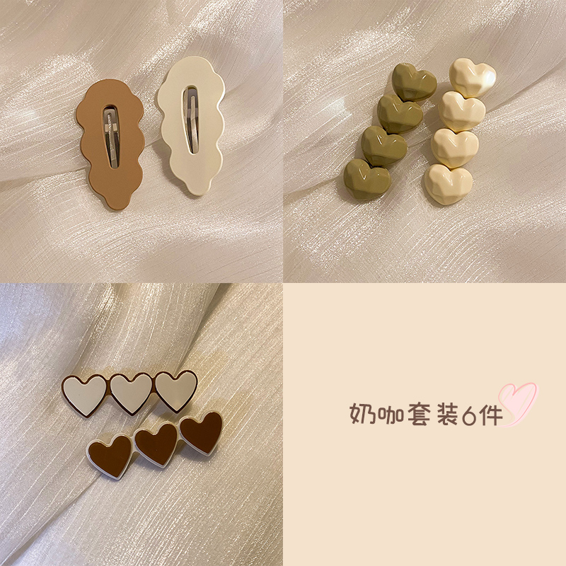 images 3:The small hair clip with the cute hair card on the side of the woman. The duck mouth is simple and exquisite Liu Hai's headdress card