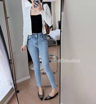 Spot self-retention waist irregular cut design elastic two-grain buckle medium-high waist small foot jeans boot pants