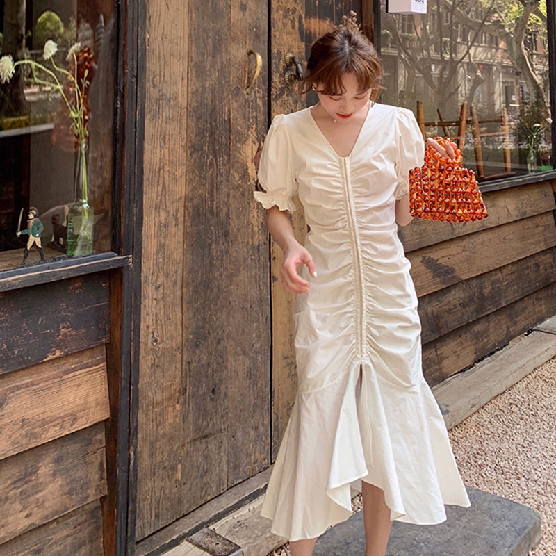 Improved cheongsam female summer 2022 one-character shoulder temperament slim French small fragrance white engagement fishtail dress