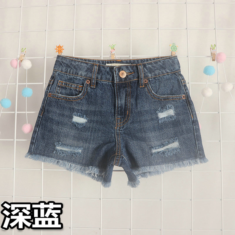 Dark Bluesummer Children's wear   girl Cotton Denim blue Wear out Rough edge Denim hot pants shorts   European and American single   code partial large