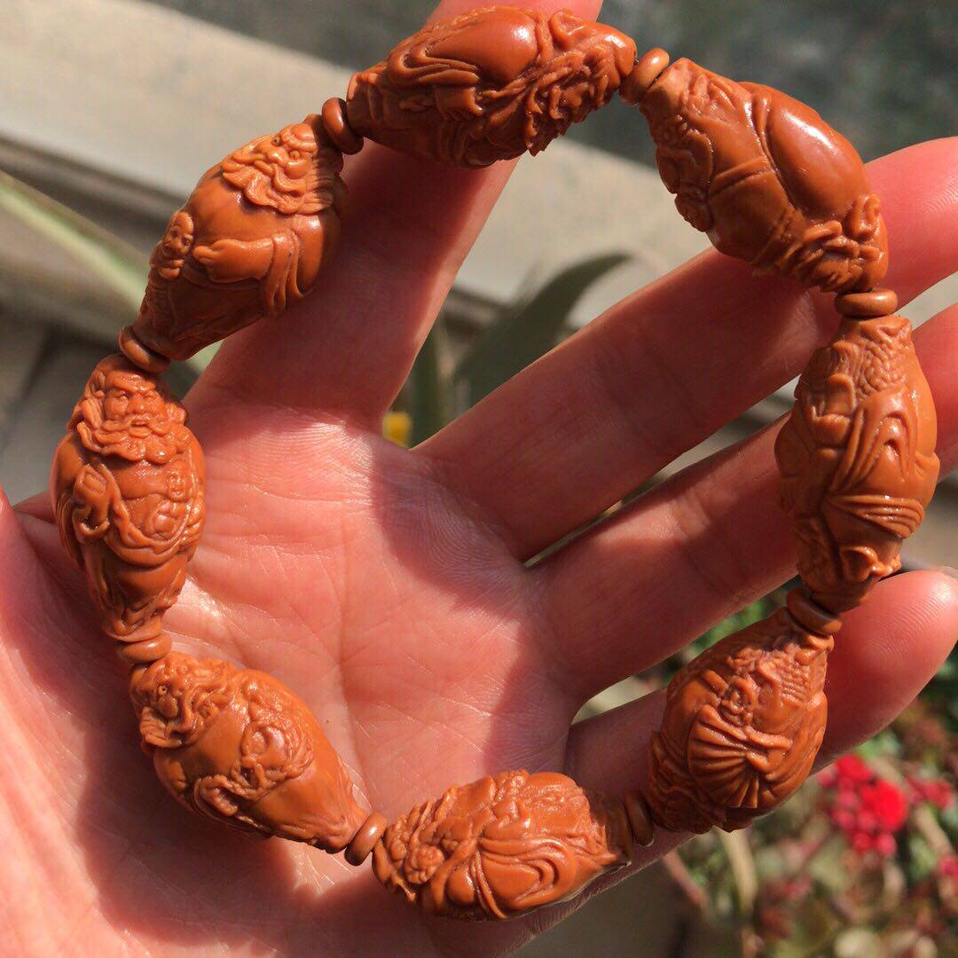 Wen playing with olive nuclear sculptor string Zhong Kui Ghostbuster Ghost Hands Strings Olive Nuclear Hand Strings Male text to play Chung Kui Voldemont's hand strings