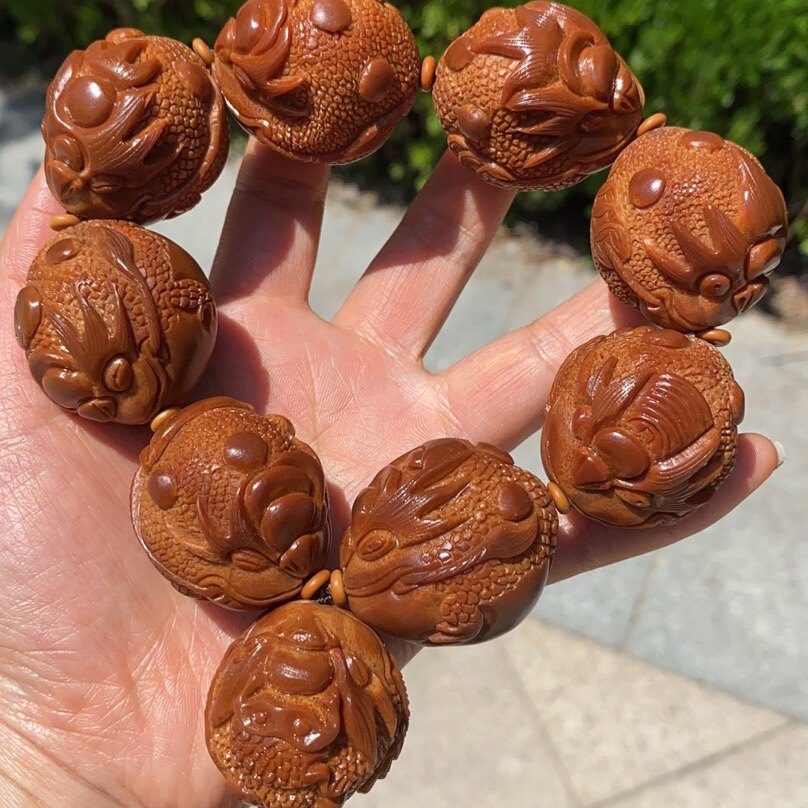 Soulful hand engraving Indonesian olive nuclear golden toad extra-large olive nuclear handheld to play the men's money