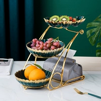 Изысканный фруктовый поднос керамический гостиная кофейня. Домохозяйка для закуски высокого класса.
