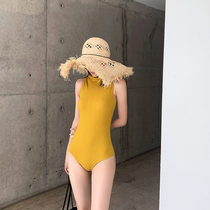 Mu lang swimsuit 2019 new ins wind fresh backless triangle thin belly cover one-piece hot spring yellow swimsuit female