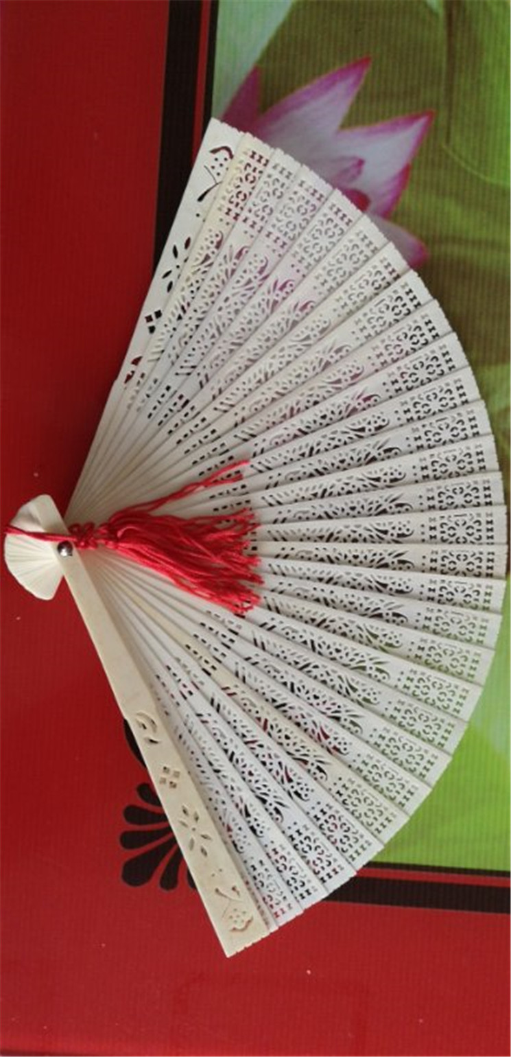 Pure cattle fracture fan pure bone old inventory hollow collection Chinese style bone carving fan foreign affairs abroad gift carving