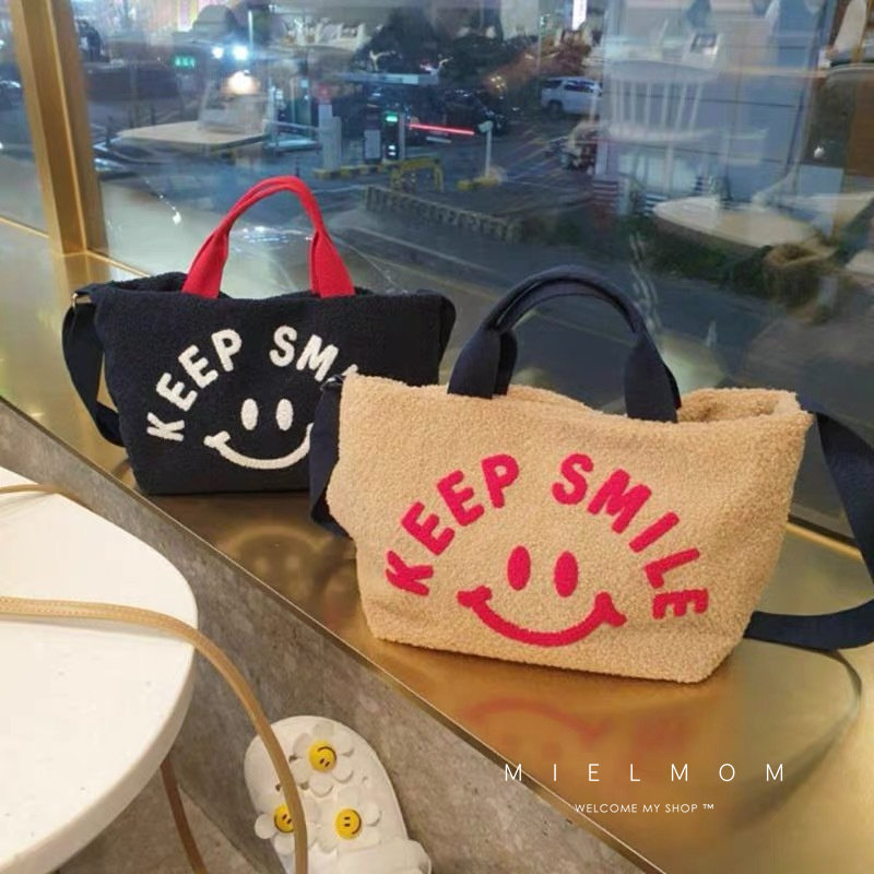 South Korea Ins moms bag large capacity lamb hair hand single shoulder bag out of multifunctional mother and baby bag inclined satchel bag