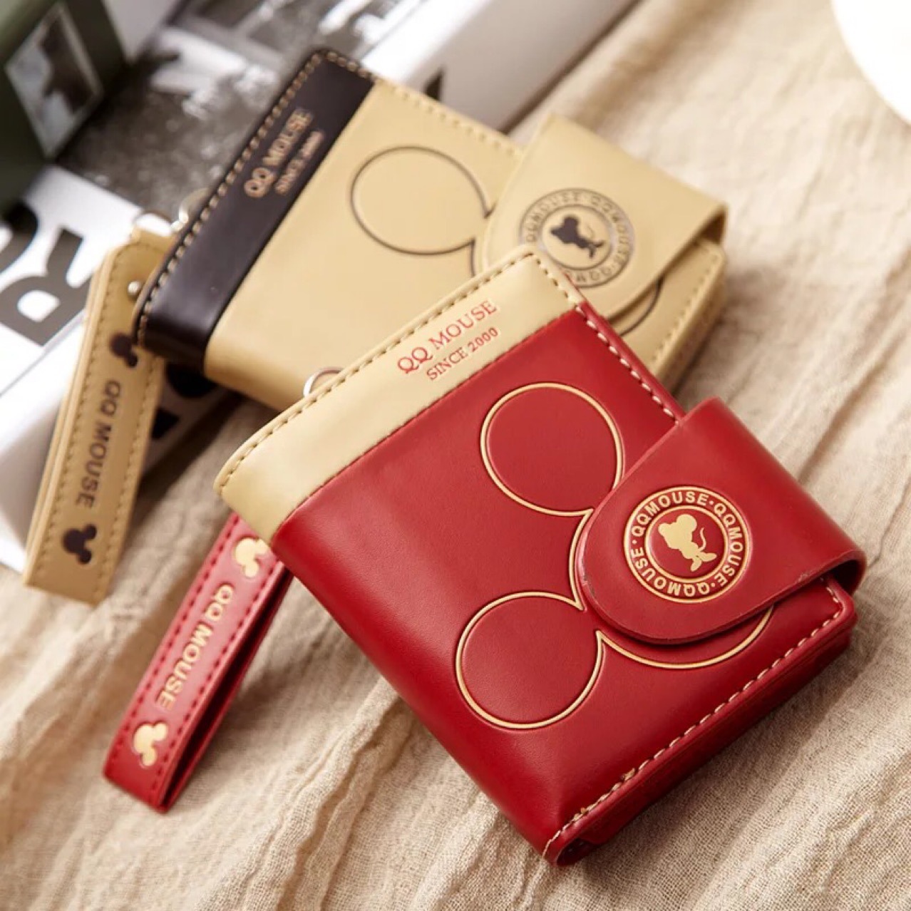 Two-fold half-fold cartoon wallet 2022 Japanese and Korean version cute small fresh fashion simple short ladies small coin purse