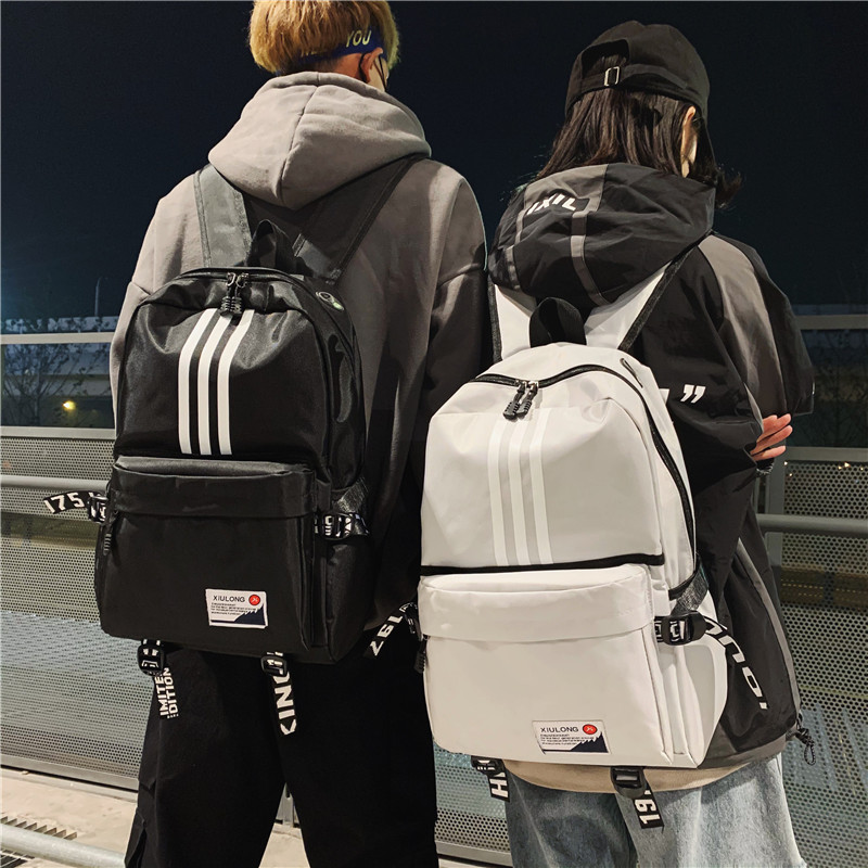 Backpack men's large capacity leisure travel bag tide school bag high school student Korean edition fashion campus simple canvas bag