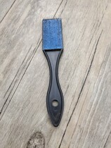 The wire brush with a rust belt rust