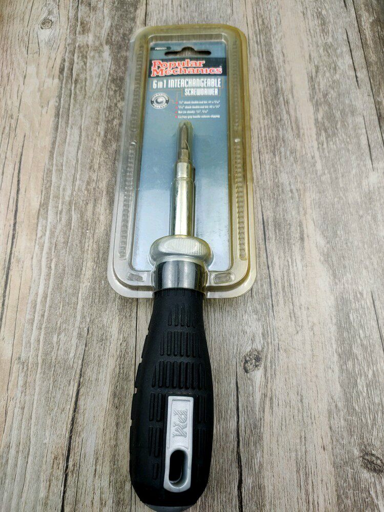 A screwdriver with a replaceable head