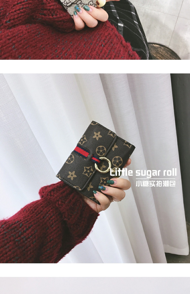 Ví nữ ngắn đoạn Châu Âu và Hoa Kỳ retro 2018 mới thời trang Hàn Quốc khóa móc tiền hoang dã kẹp ví mỏng thẻ ví ví michael kors