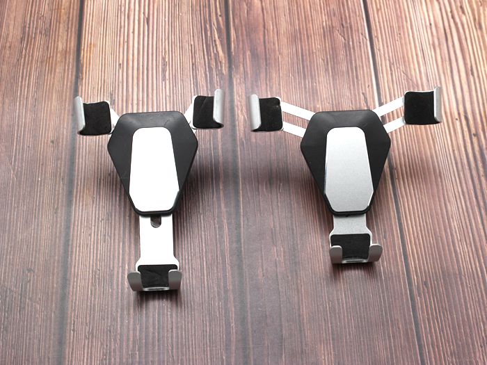 Vehicular gravity air outlet mobile phone frame car meter table navigation bracket suction cup type multifunctional buckle V shape