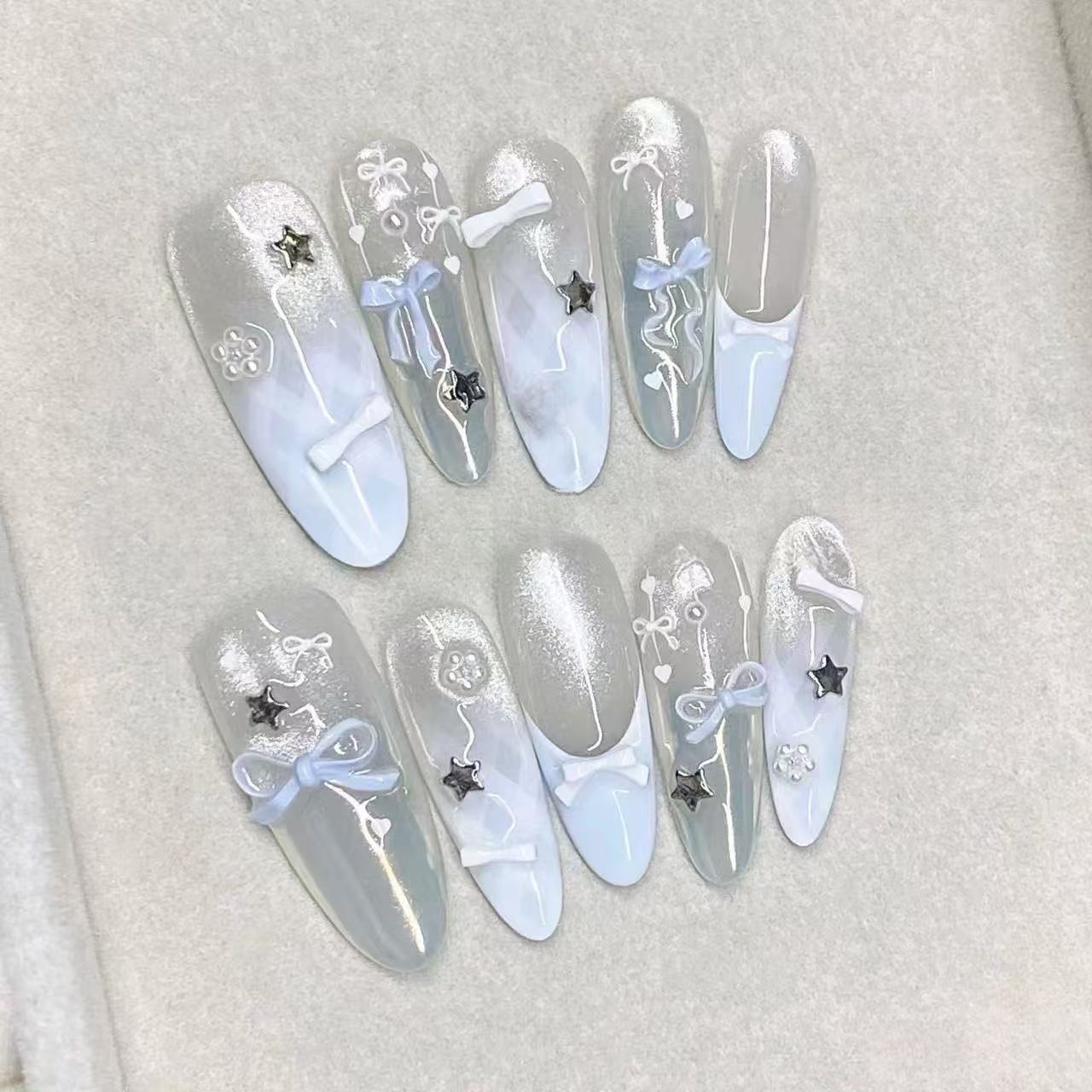 M314蓝霜半手工显白清新蓝色蝴蝶结穿戴甲法式高级猫眼美甲高级感