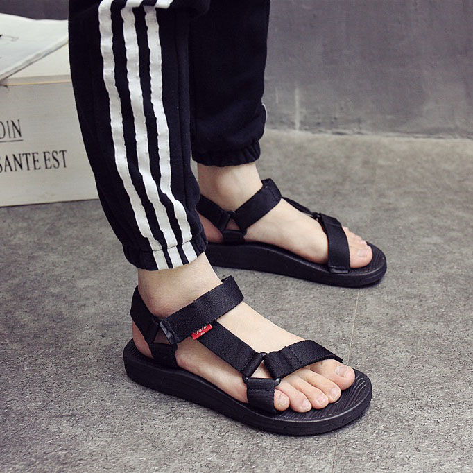 Vietnam rubber sole outdoor sandals men's shoes Korean version simple flat black cloth belt beach shoes soft bottom women's couple shoes