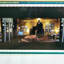 American IMAX giant screen film film grid 70mm film Superman character interior scene acrylic stage