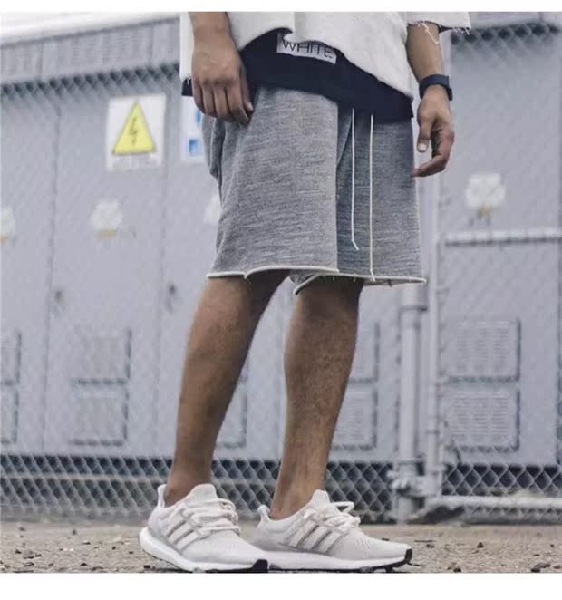 Mùa hè châu Âu và châu Mỹ hoang dã Quần short Harlan nam đường phố cao kanye xu hướng giặt tối màu cũ mặc quần thô thô - Quần short quần jean nam hàng hiệu