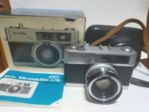 Minolta 7s works normally looks like the picture below has three lenses comes with leather bag and outer box