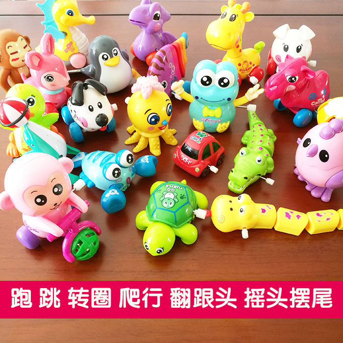 The promotion of the children on the clockwork of the clockwork on the promotion of the string toy animal will run the jumping of the chicken-chain baby to turn the puzzle car small